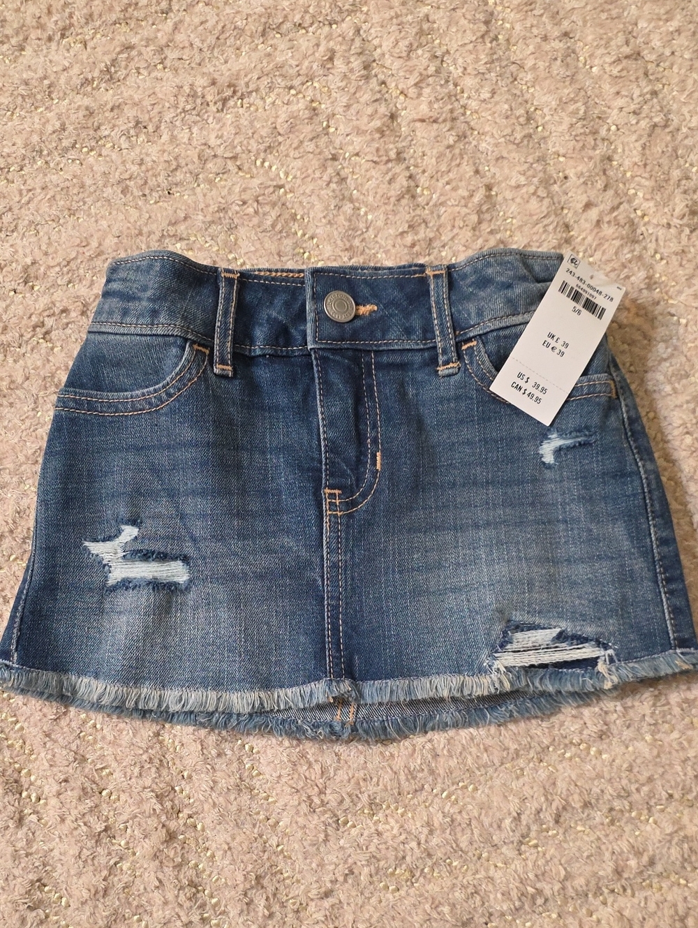 Denim Mini Skirt with Distressed Hem and Frayed Trim
